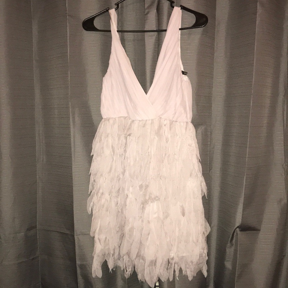 Lavender feathered “v” neck dress